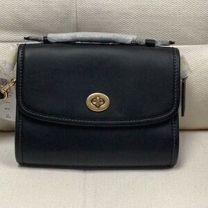 Black leather Coach crossbody